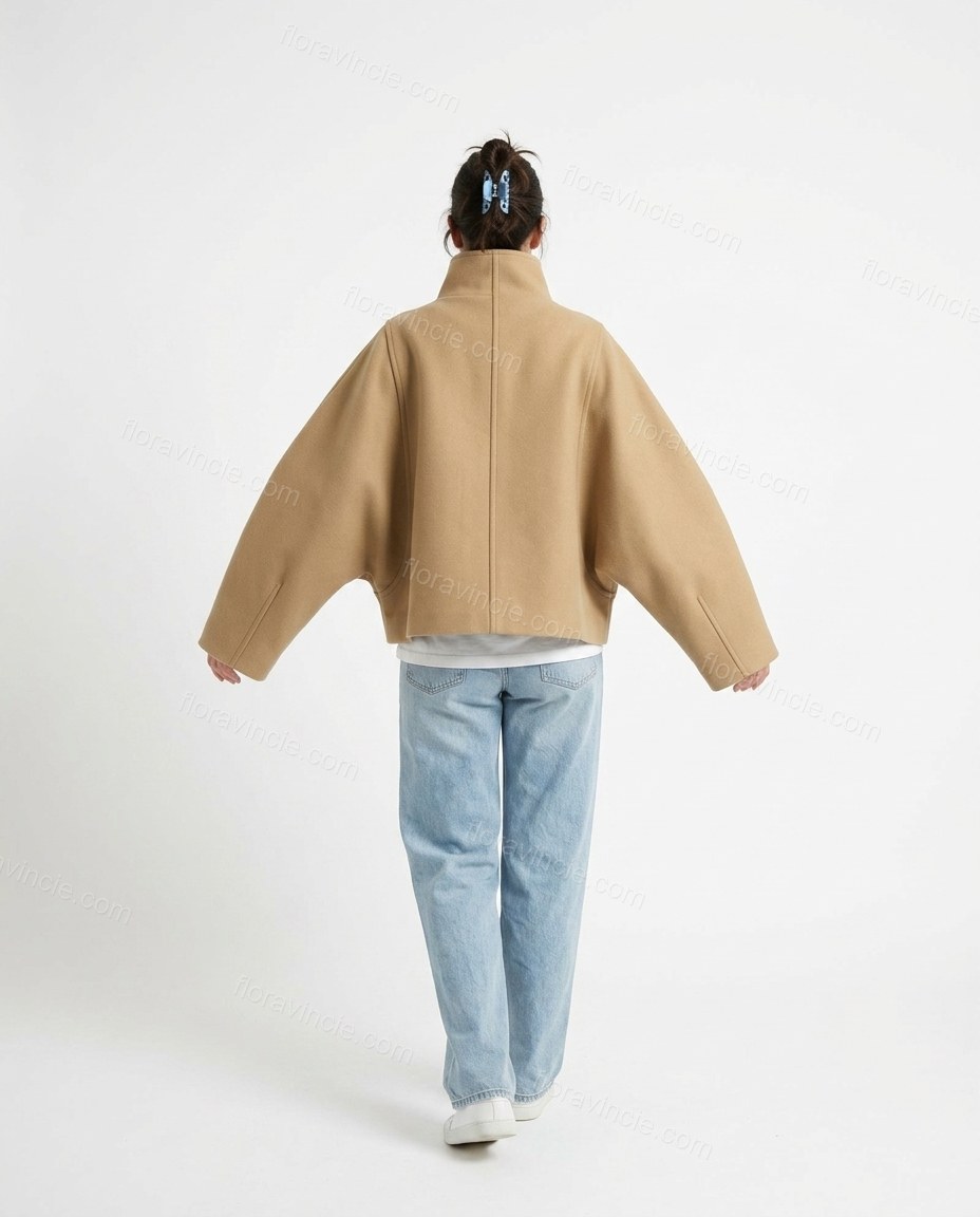 Tan Asymmetric Jacket, back studio view showing vertical center seam running down the back panel, by Floravincie