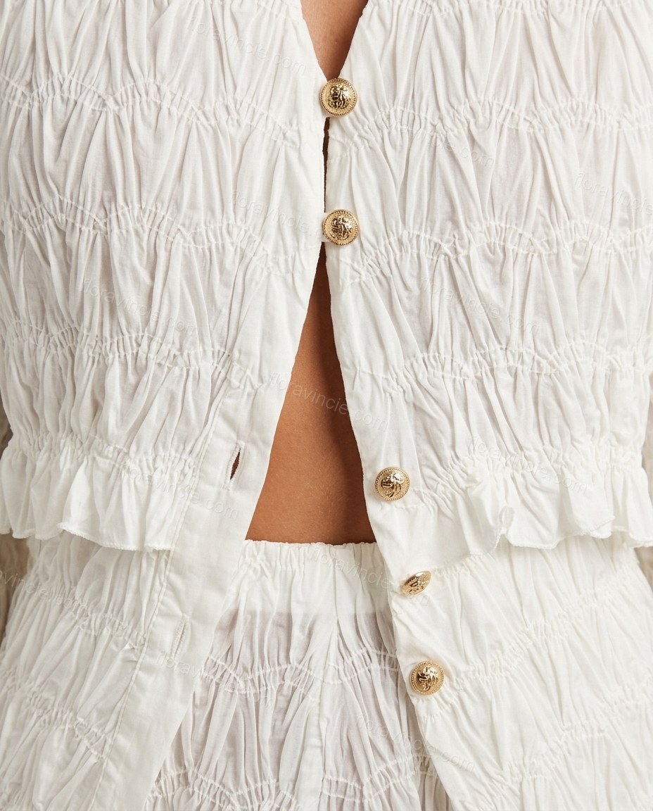Off-white Peplum Pants Set, close-up of gold accents, front button closure and gold-tone buttons, by Floravincie
