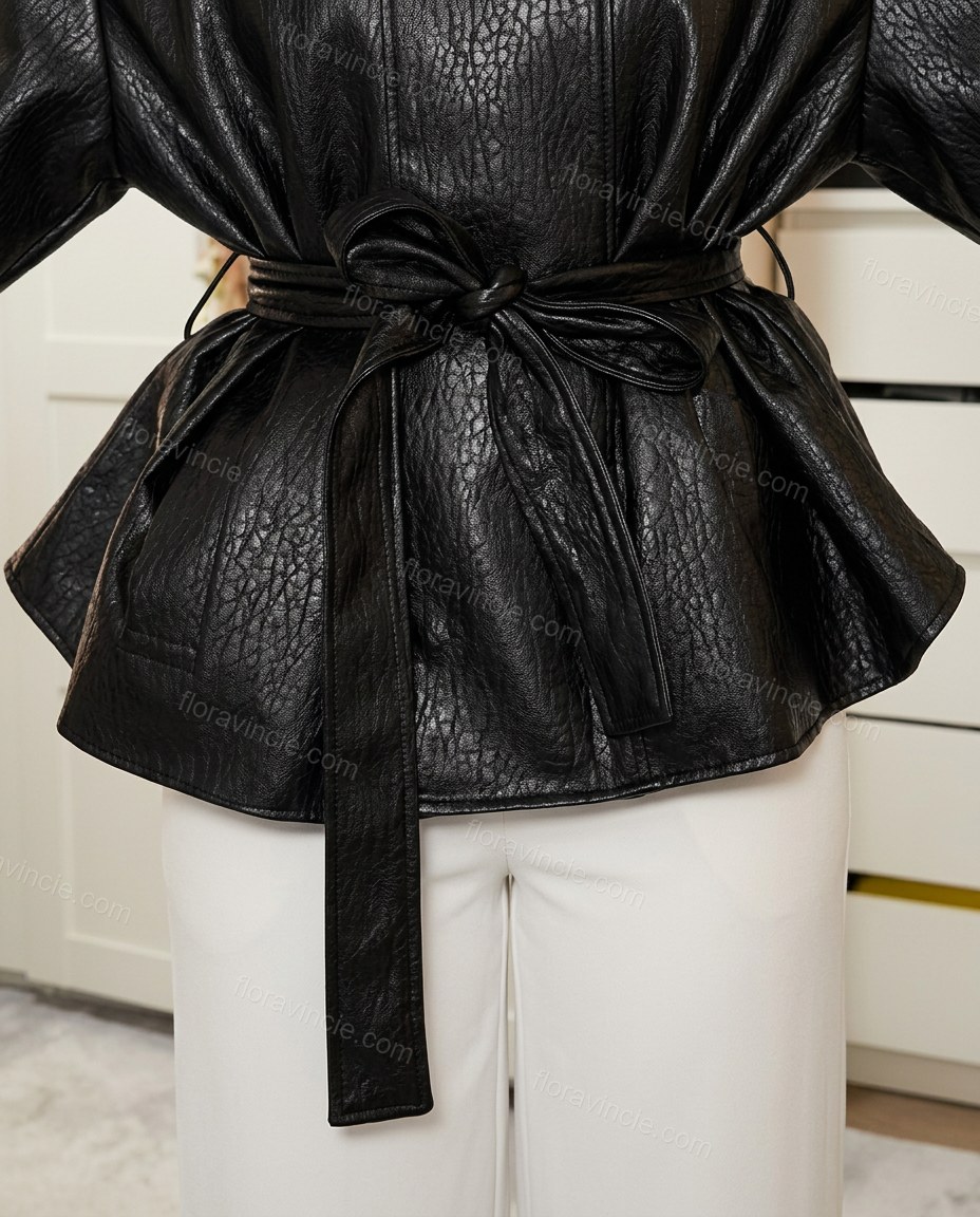 Black Peplum Jacket, close-up of self-tie belt, cuffed sleeves and peplum hem, by Floravincie