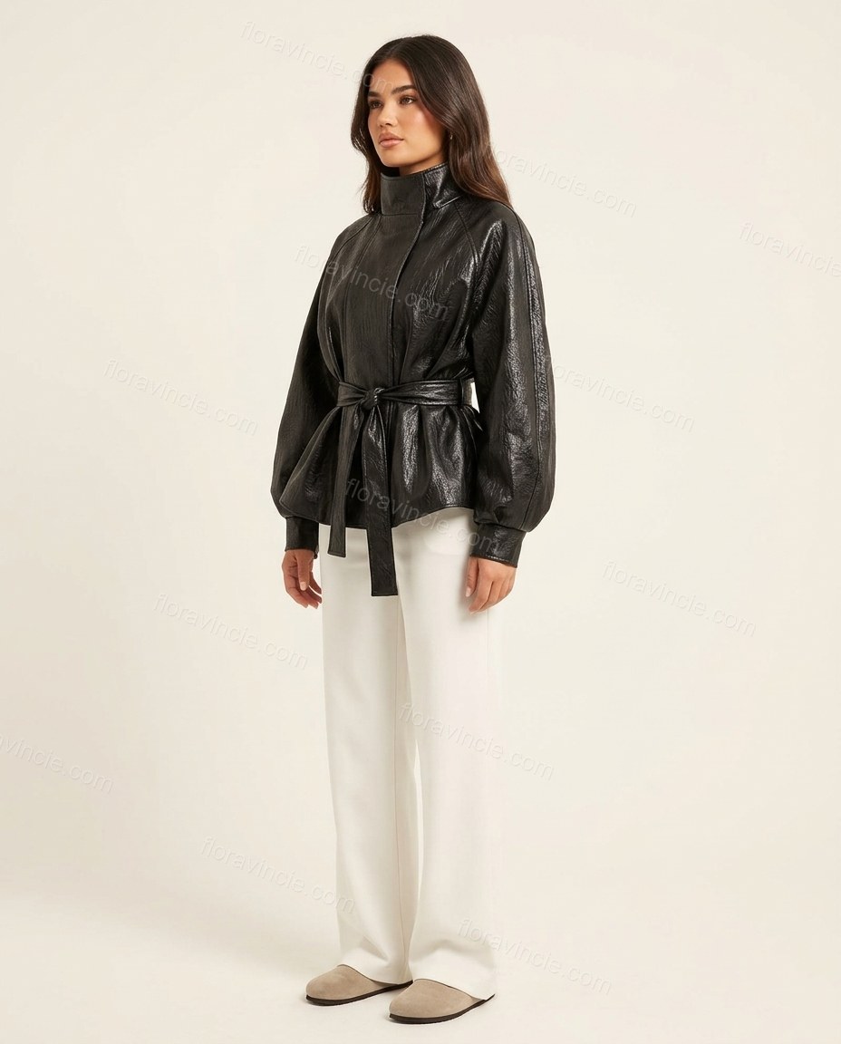 Black Peplum Jacket, side and back studio view showing clean back with flared peplum hem, by Floravincie