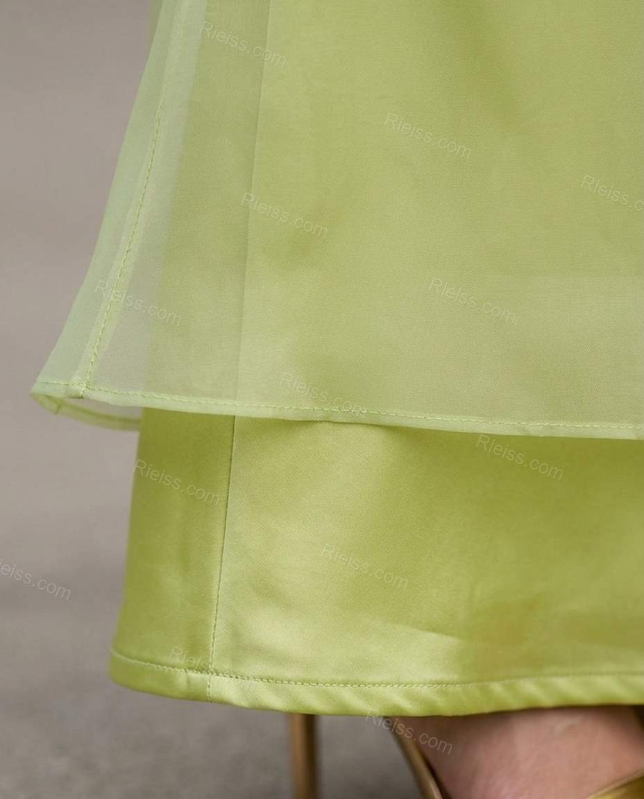Chartreuse Cape Halter Lace Dress, close-up of spaghetti straps, sheer overlay and sheer cape sleeves, by Rieiss