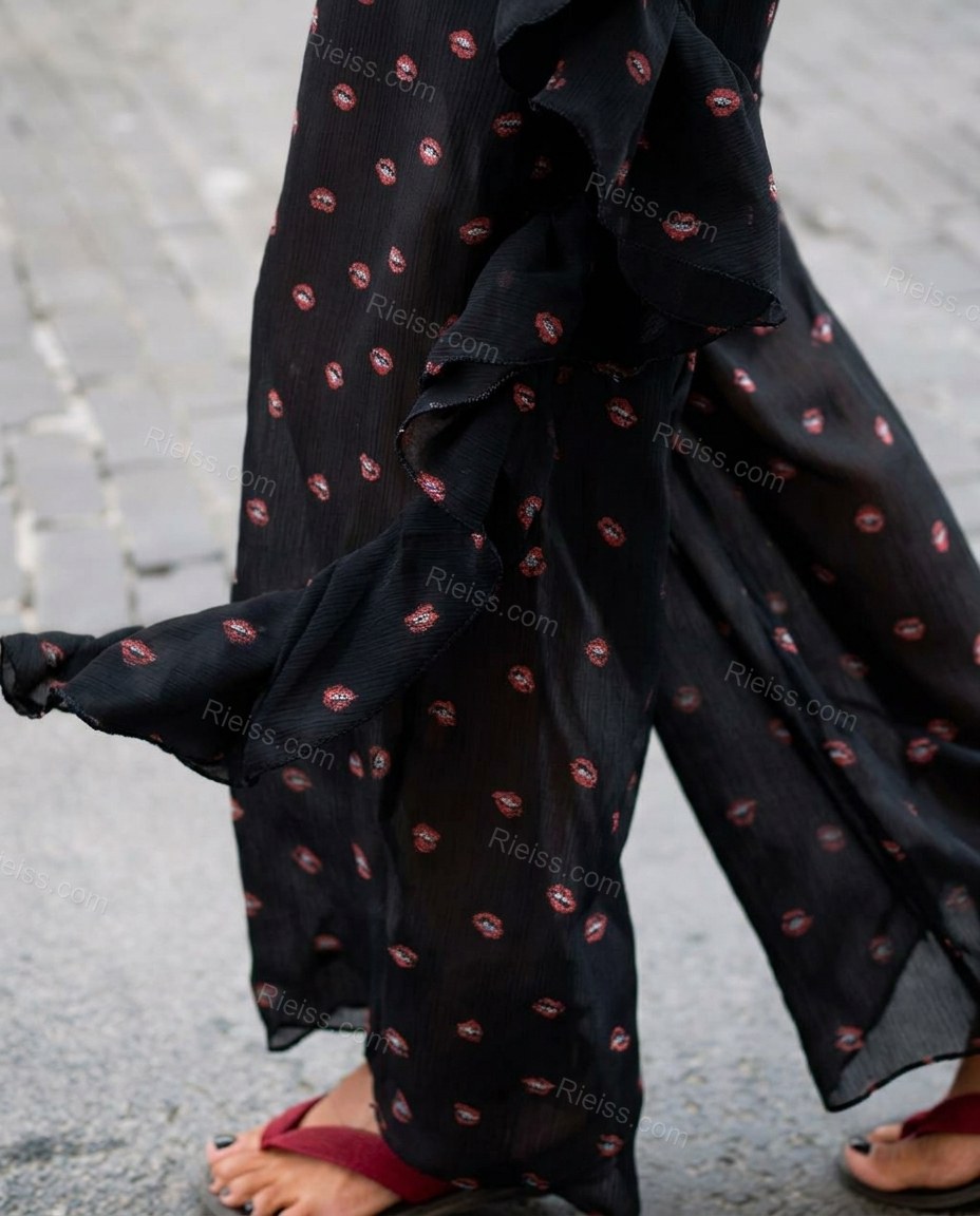 Black Polka Dot Open-Back Halter Jumpsuit, close-up of polka dot, by Rieiss