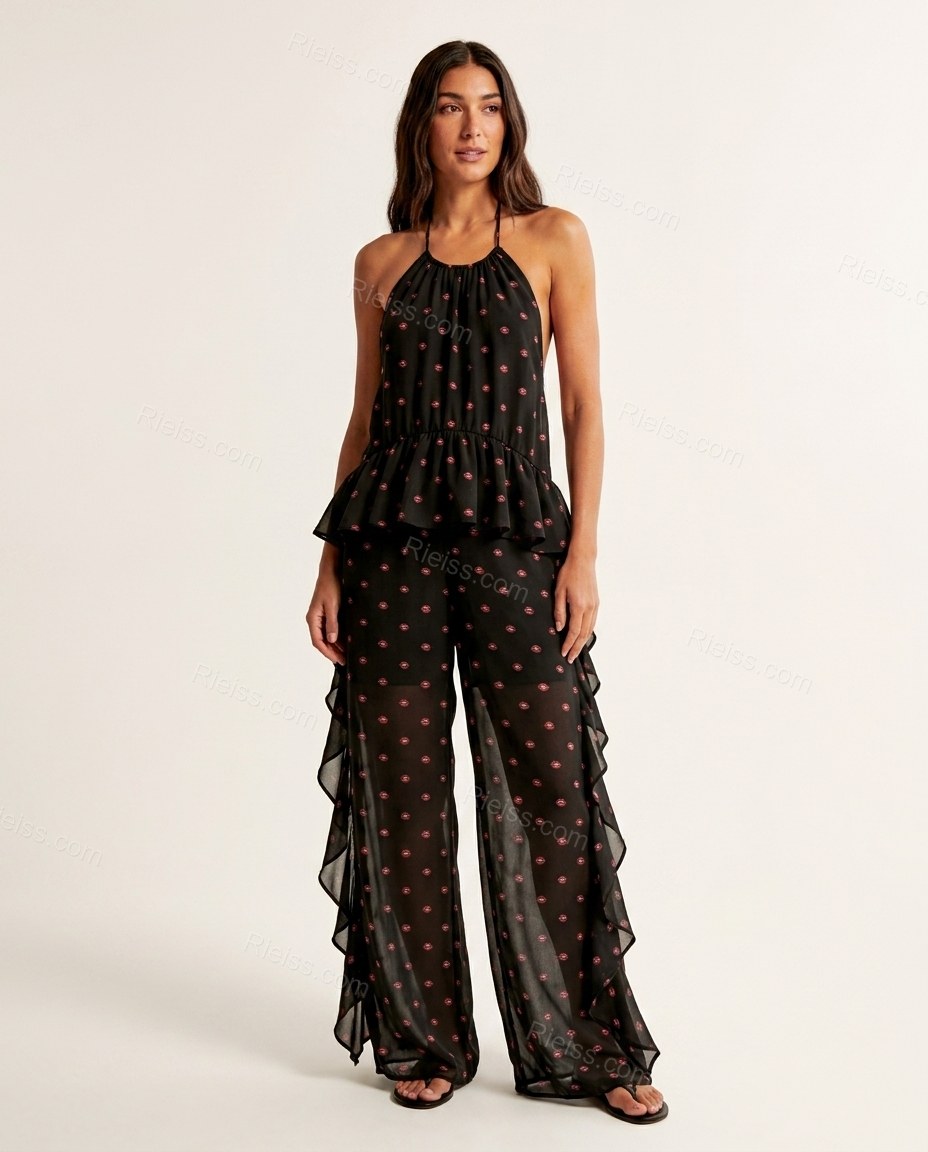 Black Polka Dot Open-Back Halter Jumpsuit, front studio view, by Rieiss