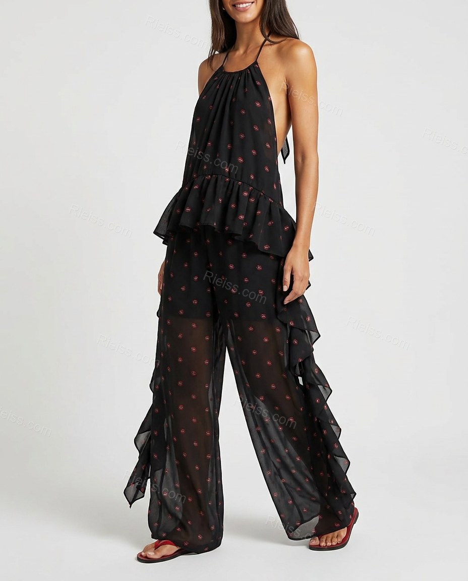 Black Polka Dot Open-Back Halter Jumpsuit, side and back studio view showing open back design with halter neck tie, by Rieiss
