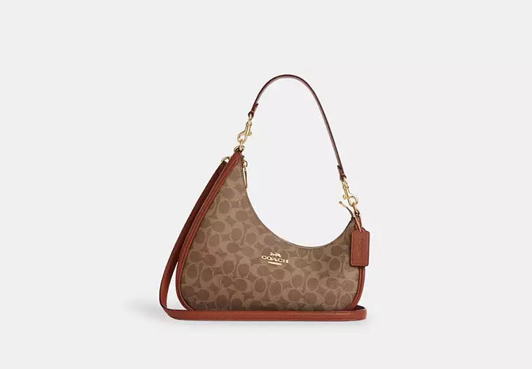 Twisted Teri Shoulder Bag In Signature Canvas