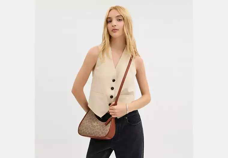 Twisted Teri Shoulder Bag In Signature Canvas