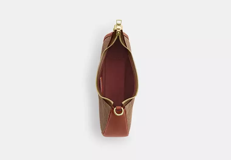 Twisted Teri Shoulder Bag In Signature Canvas
