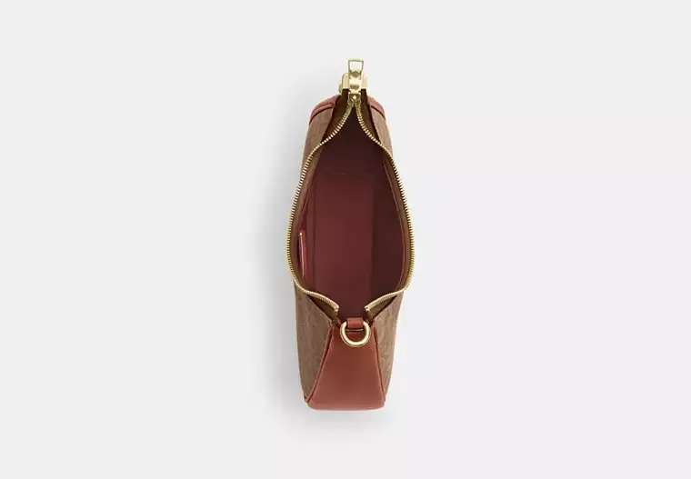 Twisted Teri Shoulder Bag In Signature Canvas