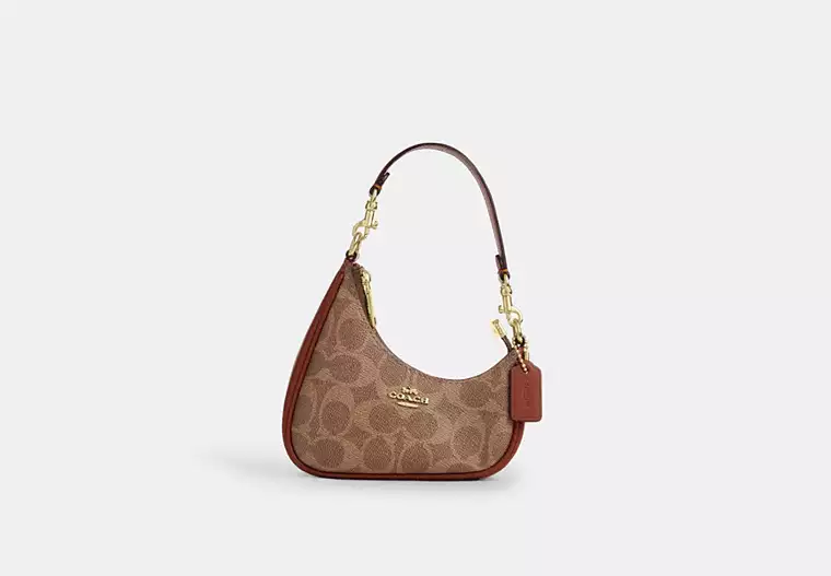 Mini Twisted Teri Bag Charm In Signature Canvas