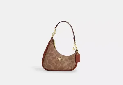 Mini Twisted Teri Bag Charm In Signature Canvas