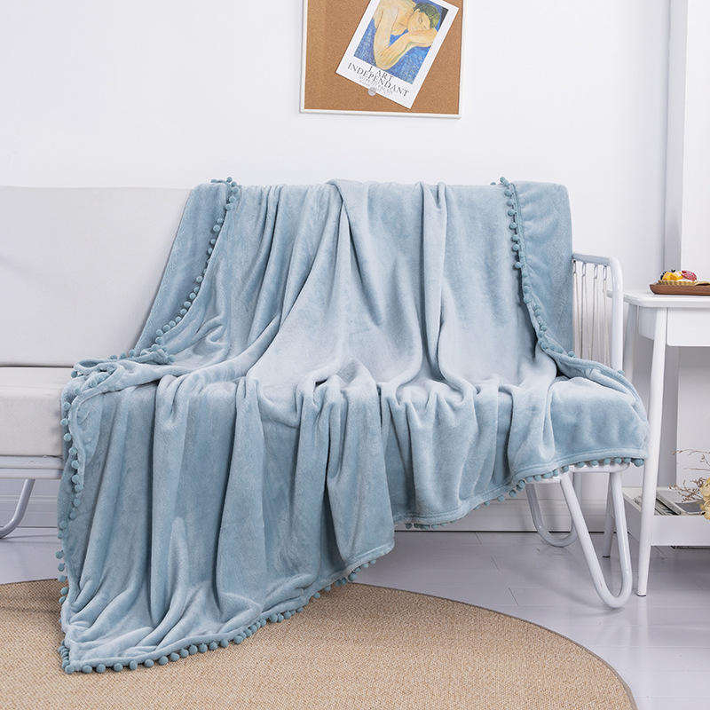 OEM ODM Wholesale Cozy Warm Flannel Blanket With Pom Pom Fringe Skin Friendly for Hotel Homestay Daily Rest Travel