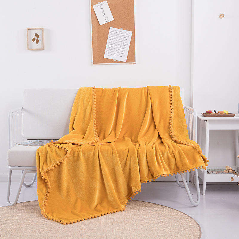 OEM ODM Wholesale Cozy Warm Flannel Blanket With Pom Pom Fringe Skin Friendly for Hotel Homestay Daily Rest Travel
