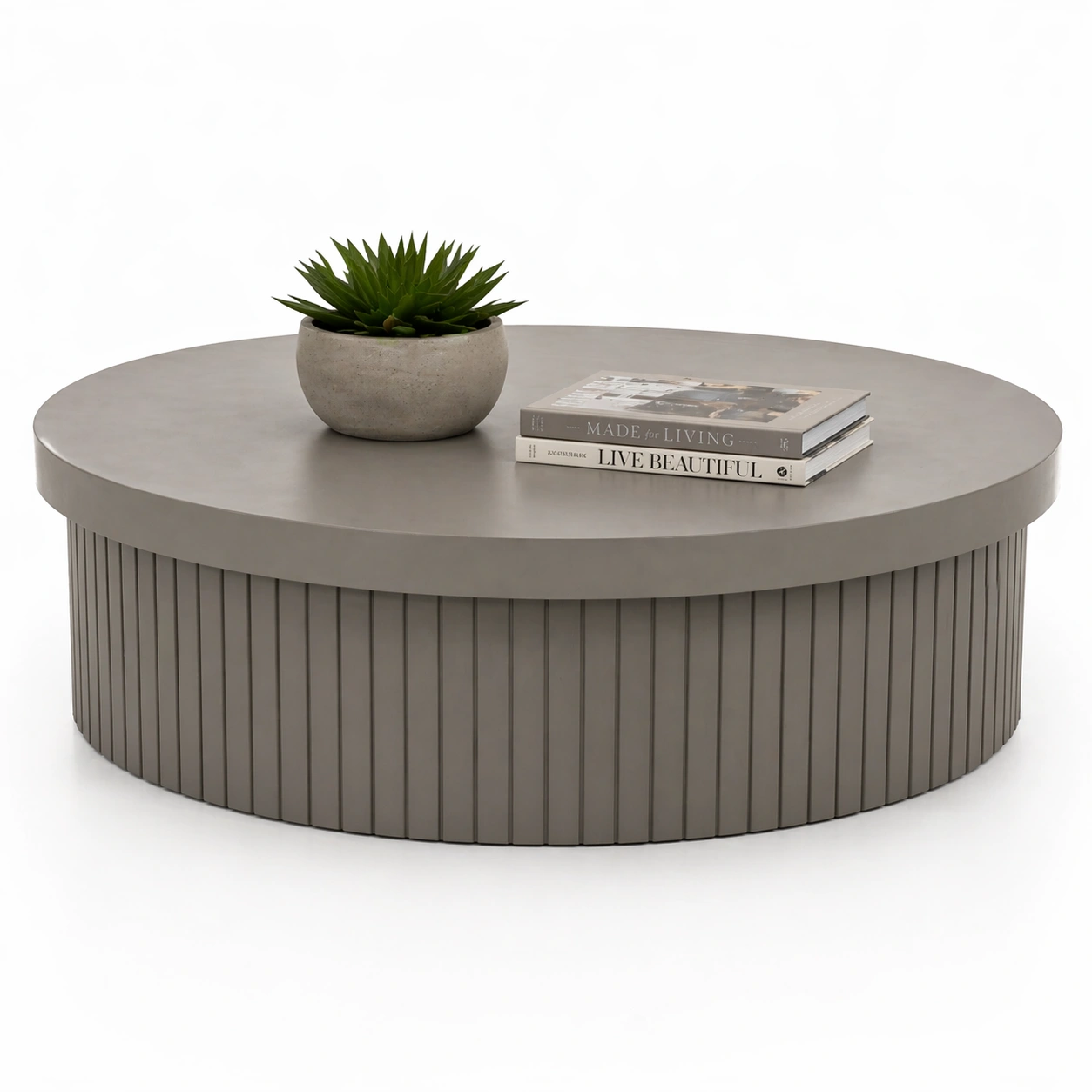 Mesa de centro redonda gris claro con base texturizada