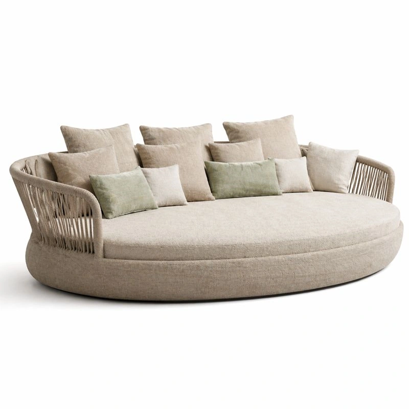 Sofa redondo moderno beige con estructura de cuerda y cojines multiples