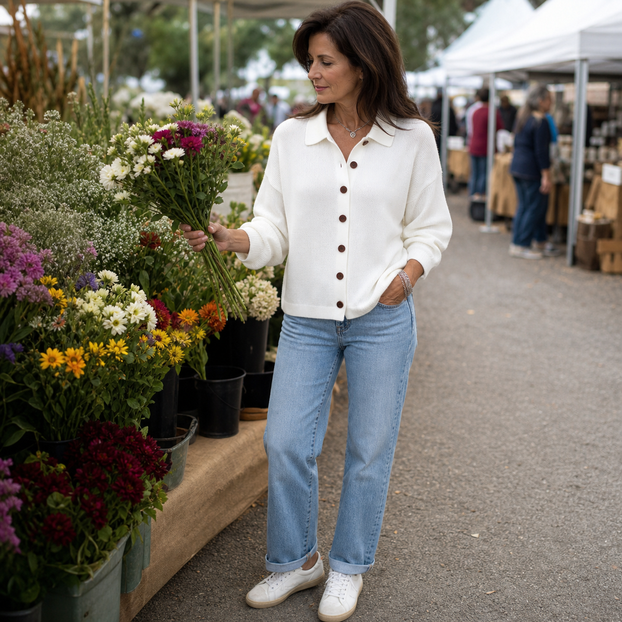Woman wearing cardigan at flower market