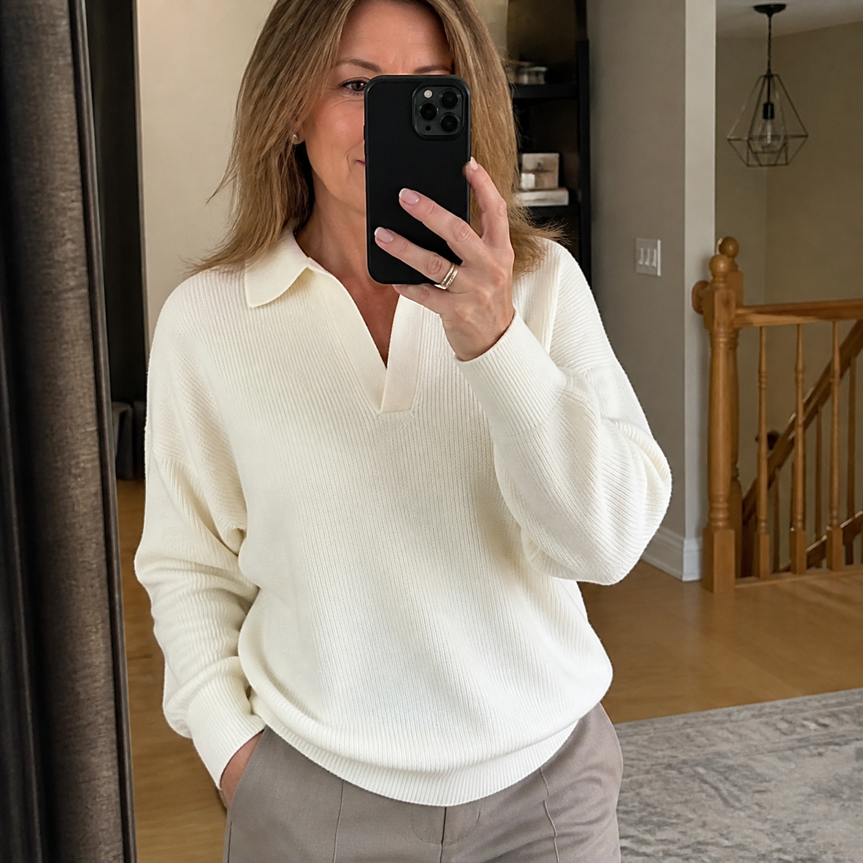 Ivory rib-knit polo sweater in a customer mirror photo