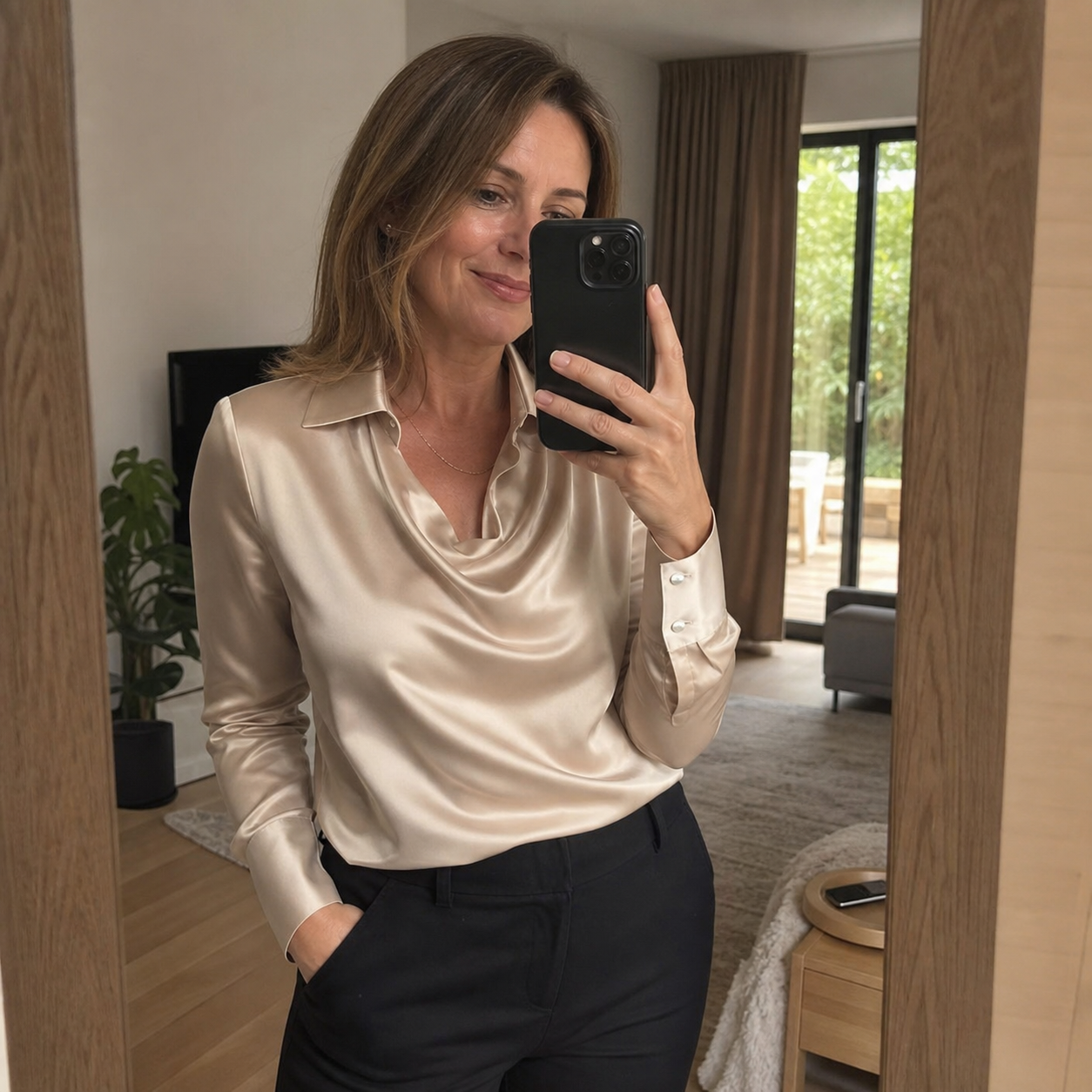 Customer mirror selfie in the Champagne satin blouse