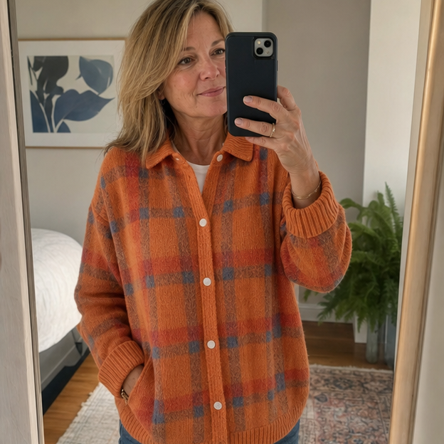 Customer mirror photo in orange plaid knit