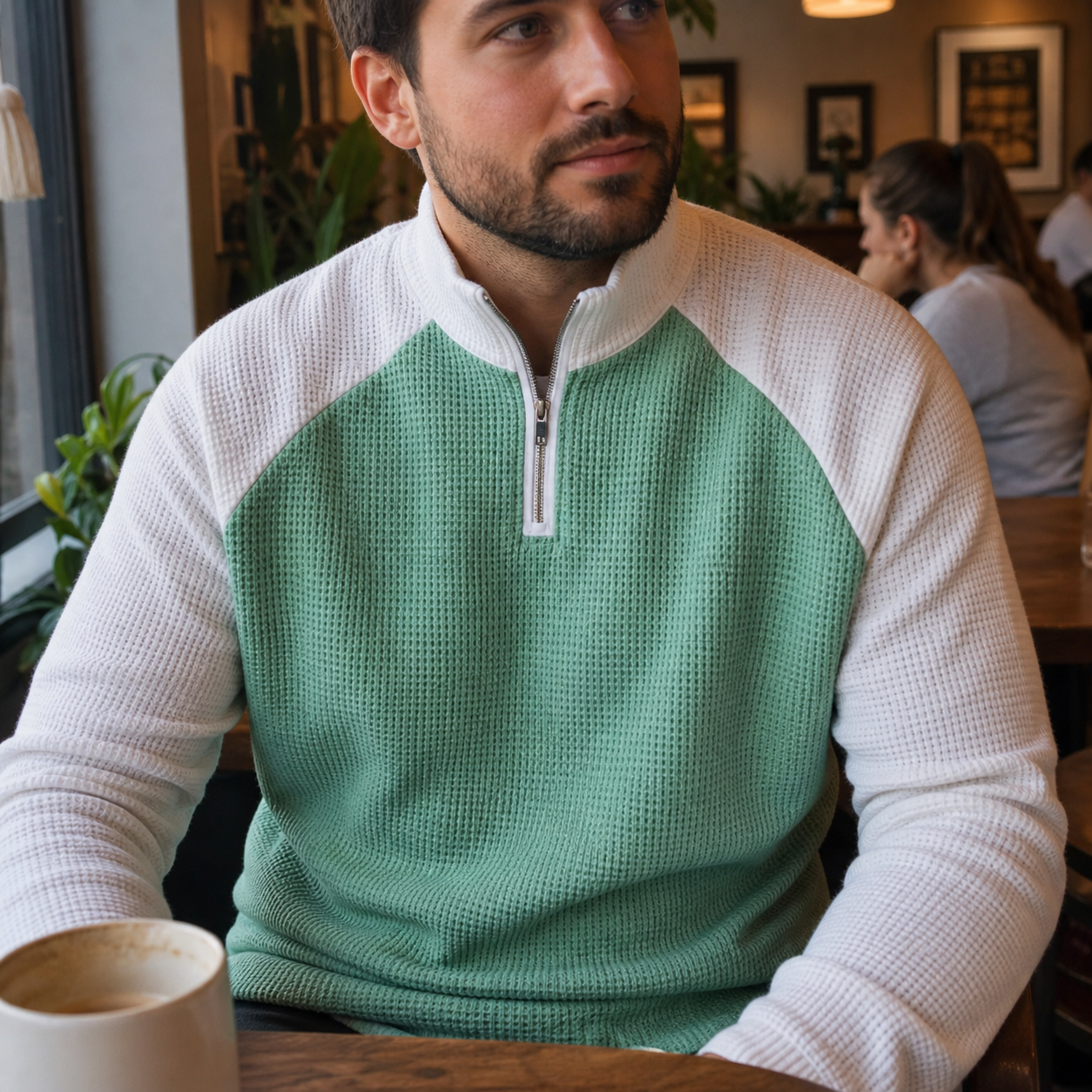 Customer cafe photo in the Mint Green and White color-block waffle half-zip pullover