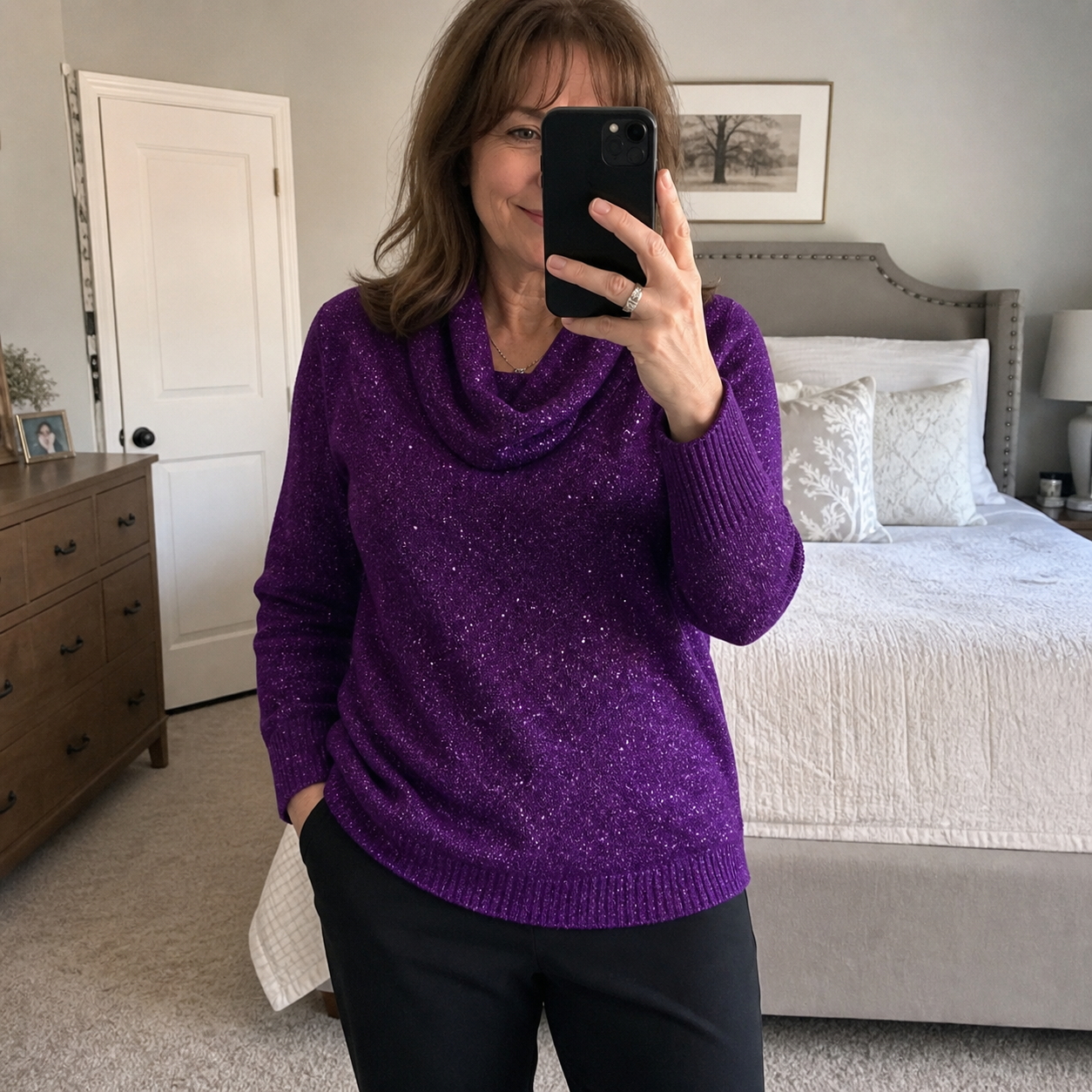 Customer mirror selfie wearing the Purple sweater