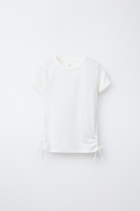 T-SHIRT WITH MODAL CUT-OUT BOWS