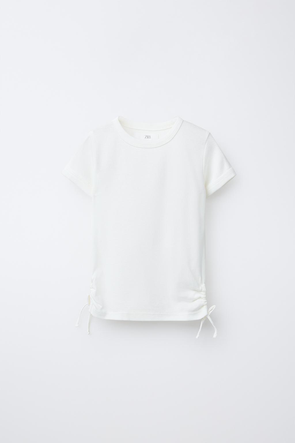 T-SHIRT WITH MODAL CUT-OUT BOWS