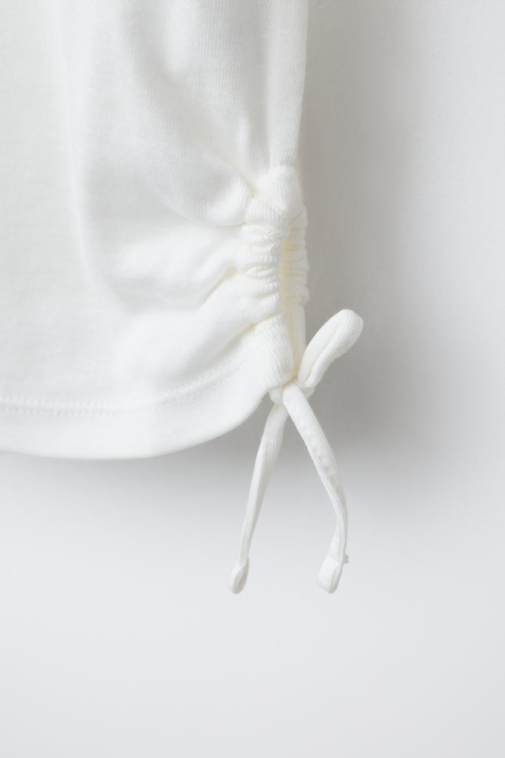 T-SHIRT WITH MODAL CUT-OUT BOWS