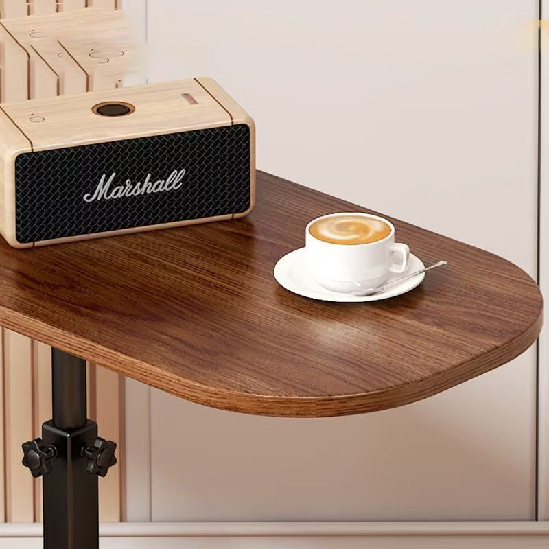 A height-adjustable small table for storage in the living room