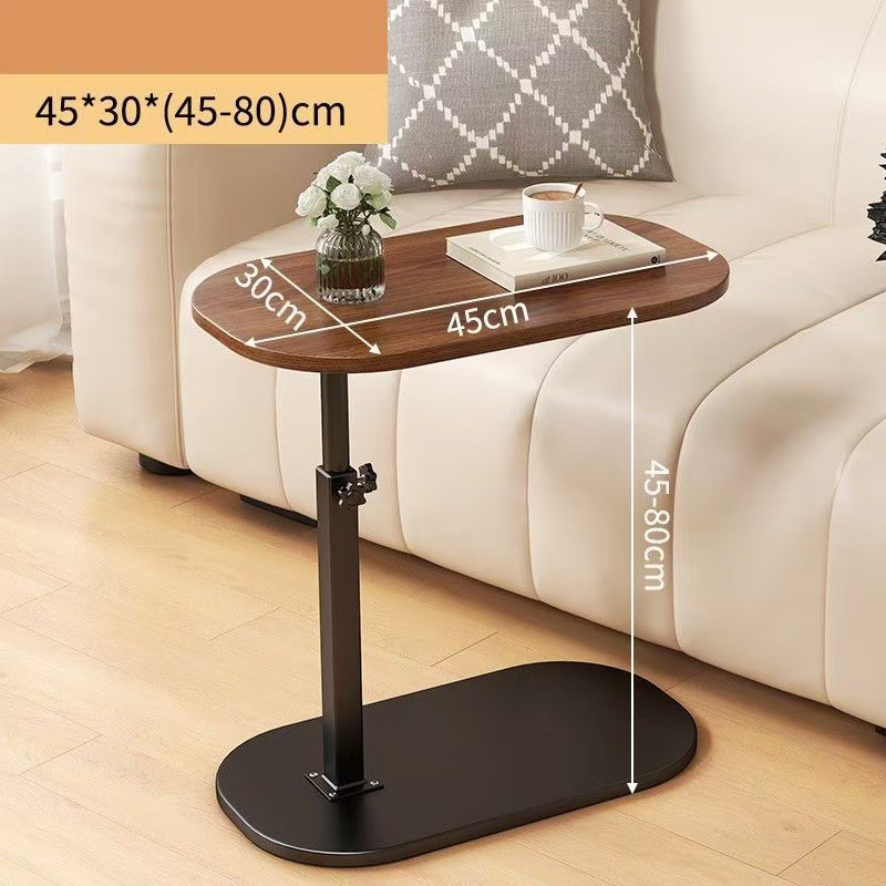 A height-adjustable small table for storage in the living room