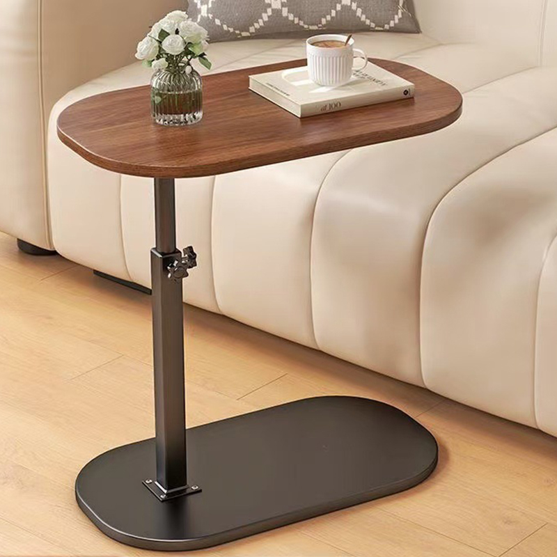 A height-adjustable small table for storage in the living room