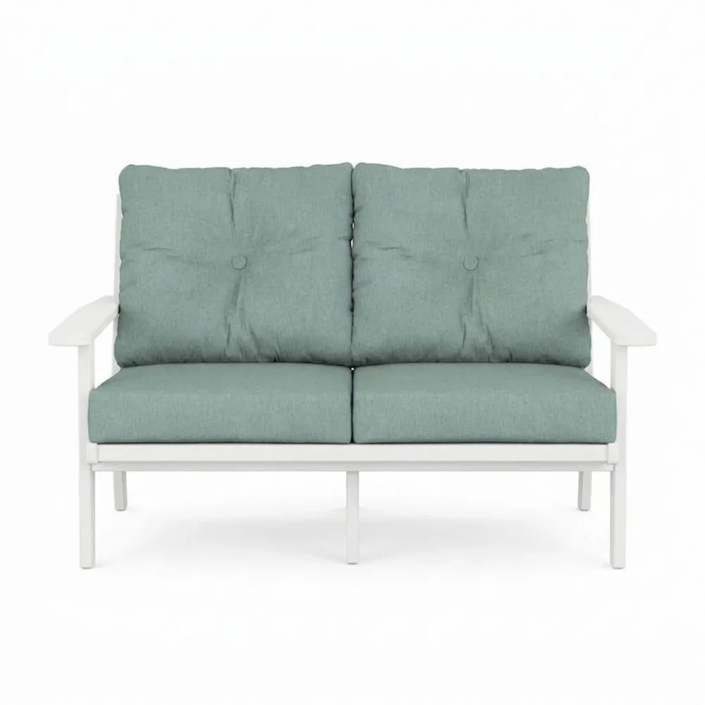 Zweisitzer-Sofa aus Aluminium mit türkisen Kissen