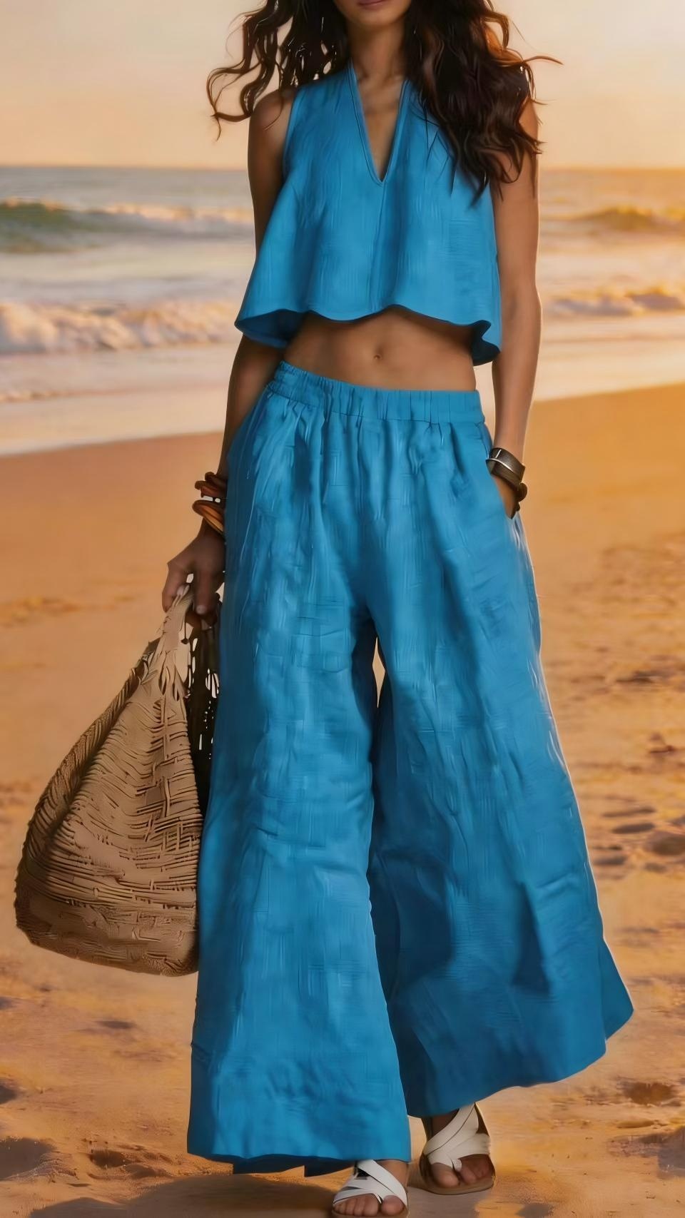 A two-piece linen suit for women, a vacation-style sleeveless top and wide-leg pants