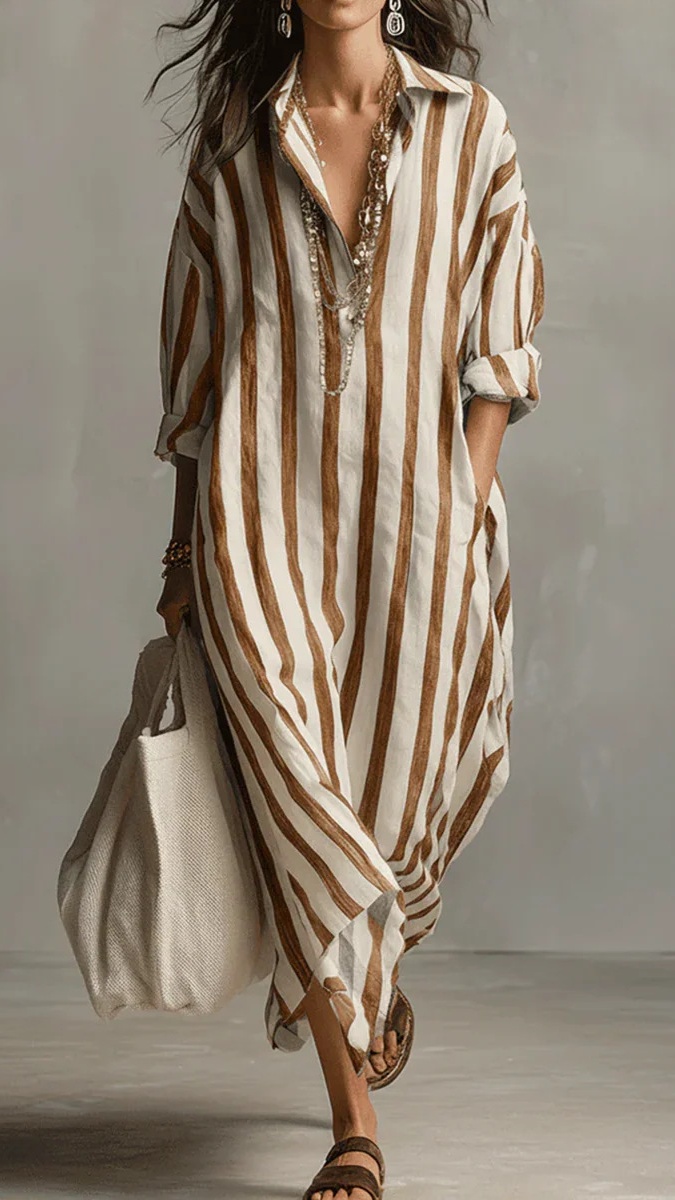 A fashionable loose V-neck long striped nine-quarter sleeve shirt dress for women
