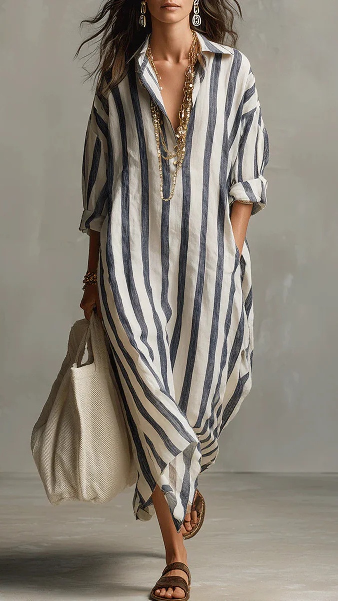 A fashionable loose V-neck long striped nine-quarter sleeve shirt dress for women