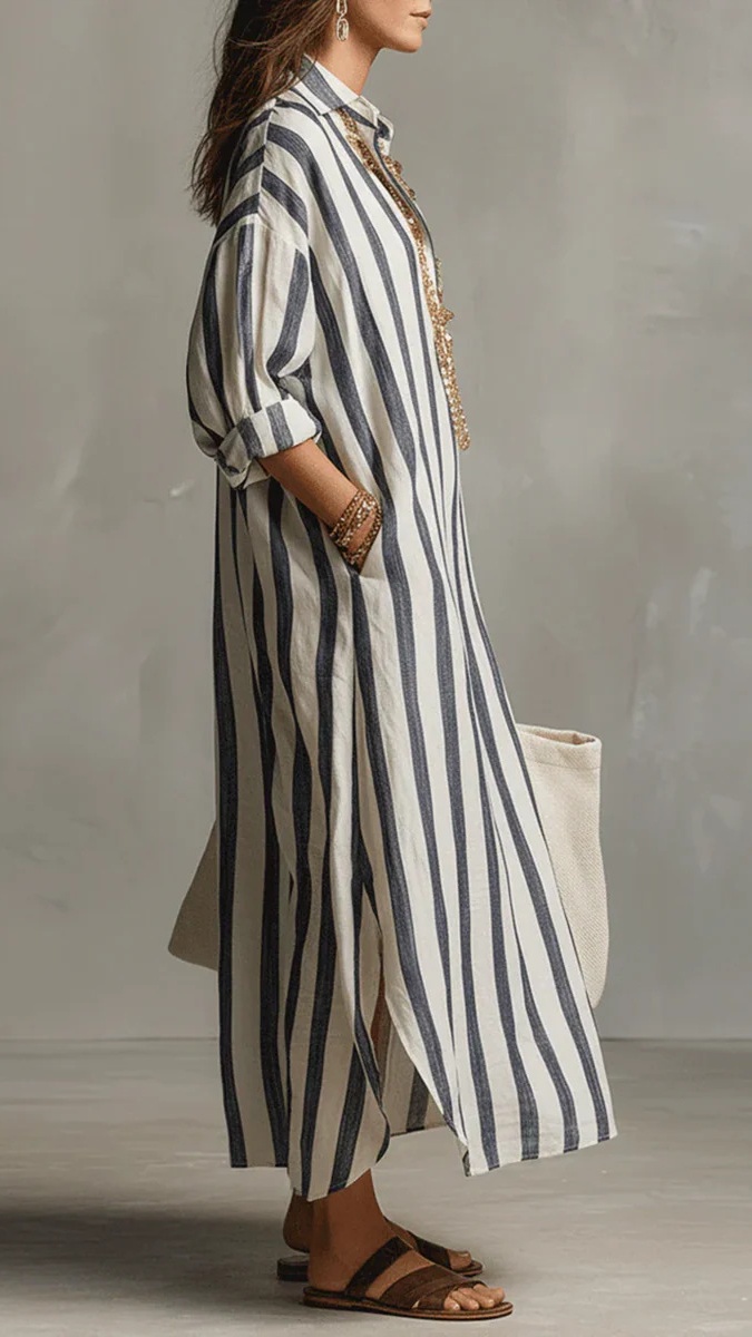 A fashionable loose V-neck long striped nine-quarter sleeve shirt dress for women