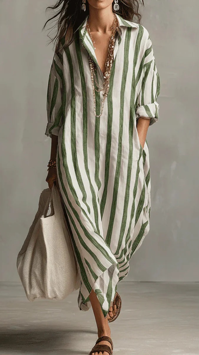 A fashionable loose V-neck long striped nine-quarter sleeve shirt dress for women