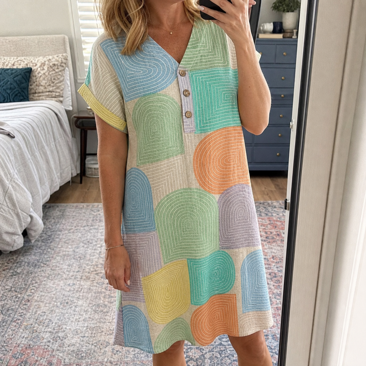 Customer wearing geo print dress