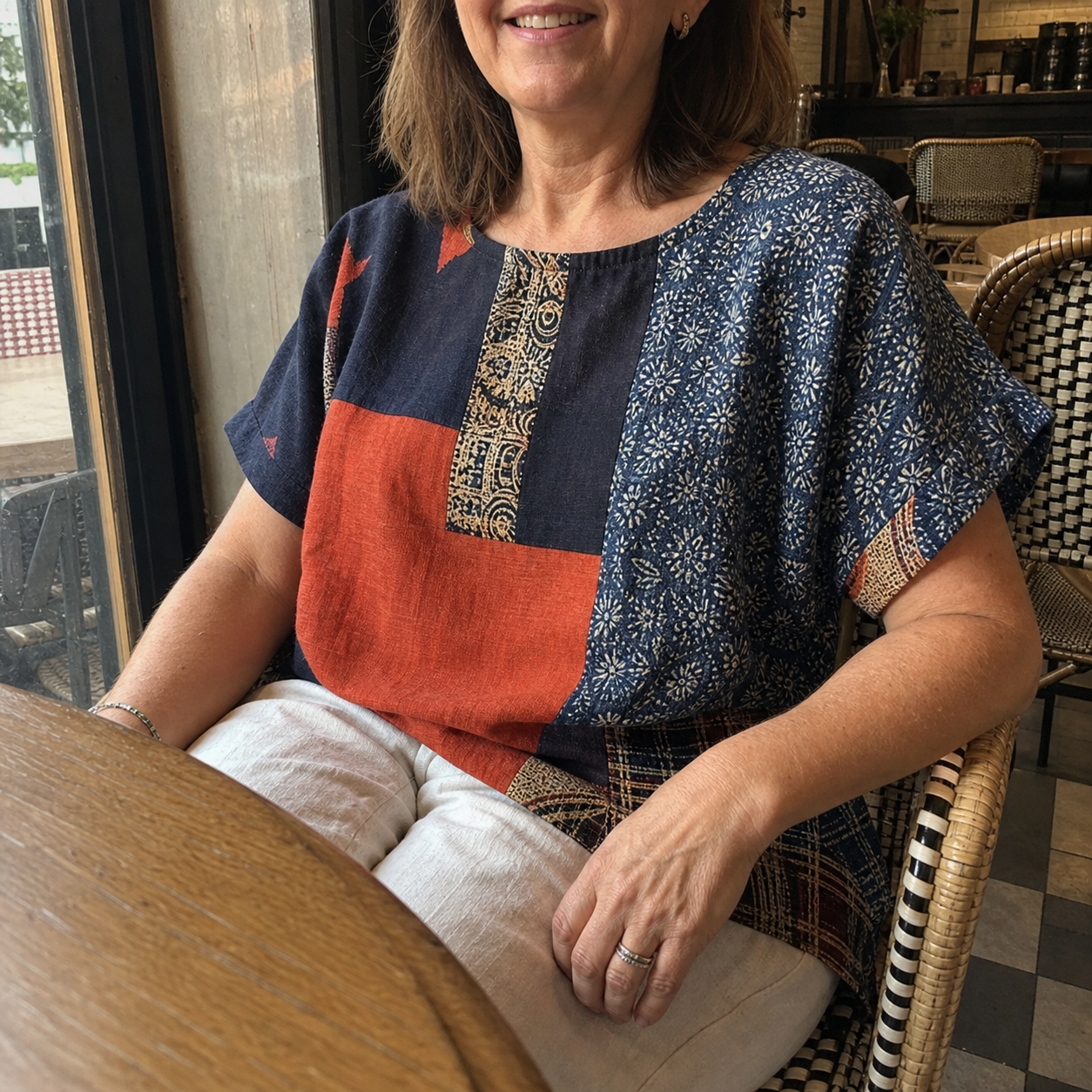 Customer wearing patchwork top