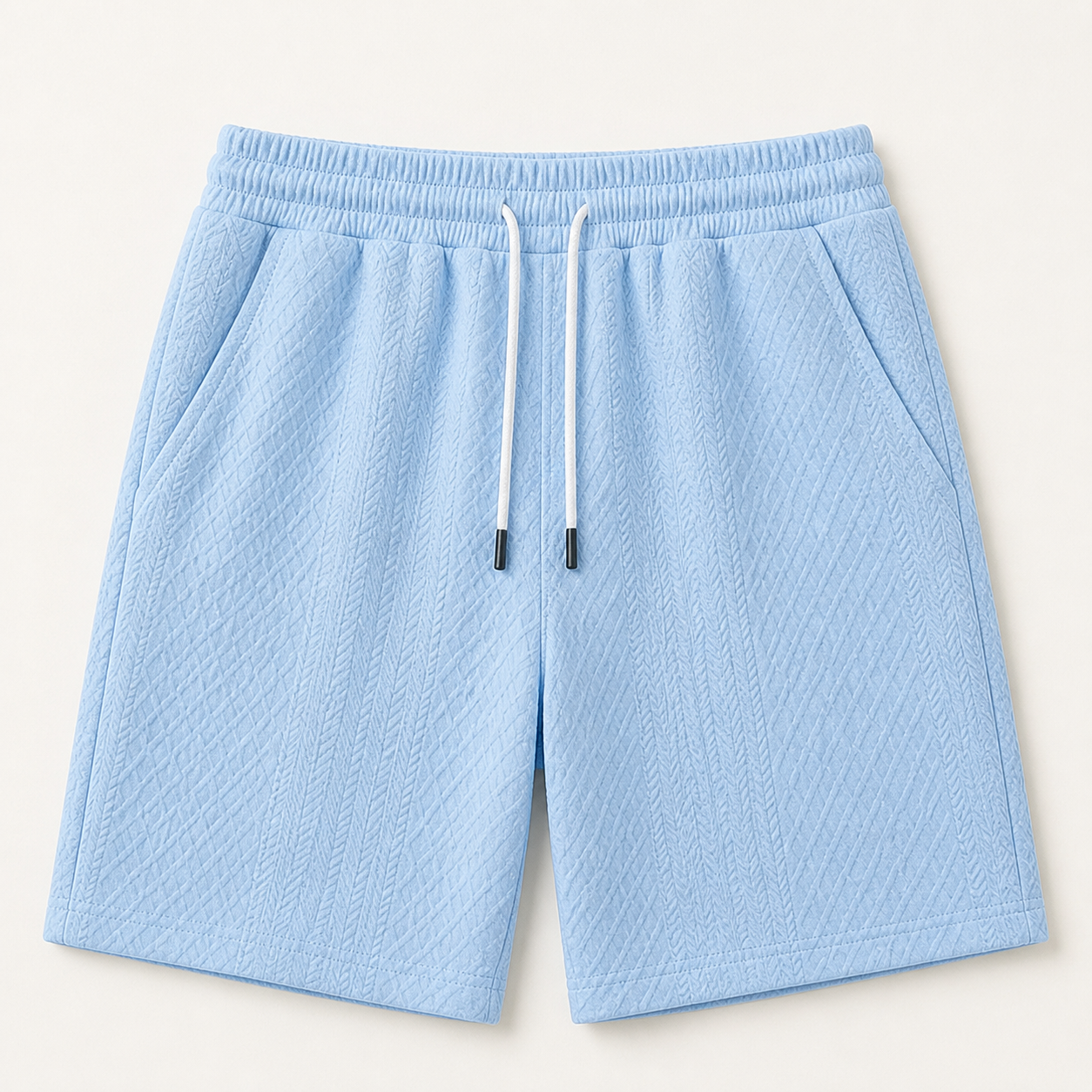 Détail de la taille élastiquée du cordon et des poches latérales