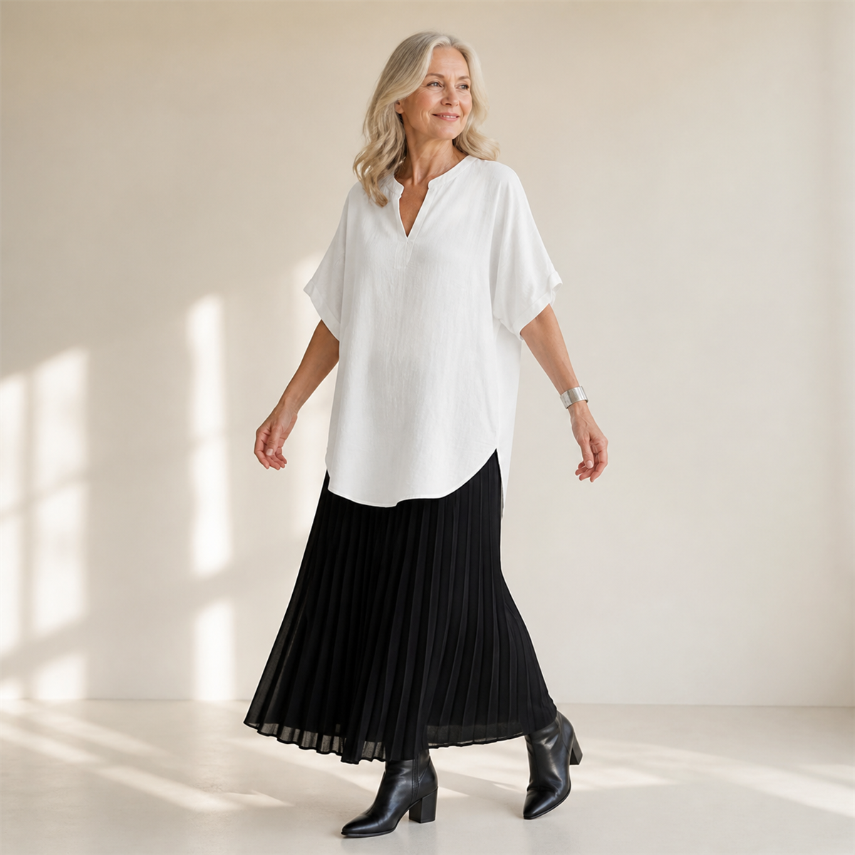 Top femme blanc associ&eacute; &agrave; une jupe noire