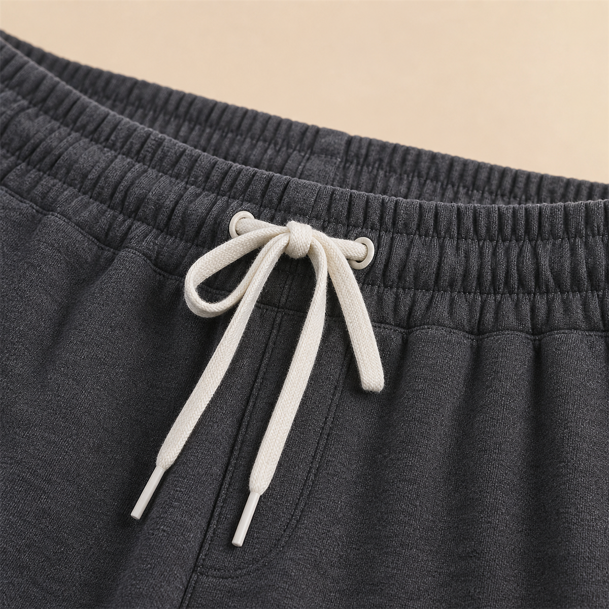 Pantalon de jogging court et large homme - Detail : taille élastiquée avec cordon