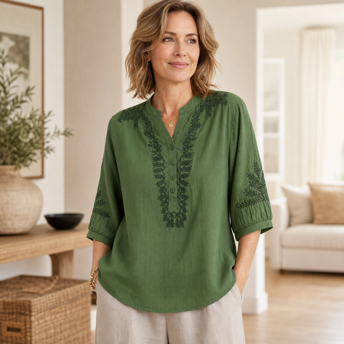 4tu0715002 mature woman wearing embroidered V-neck blouse
