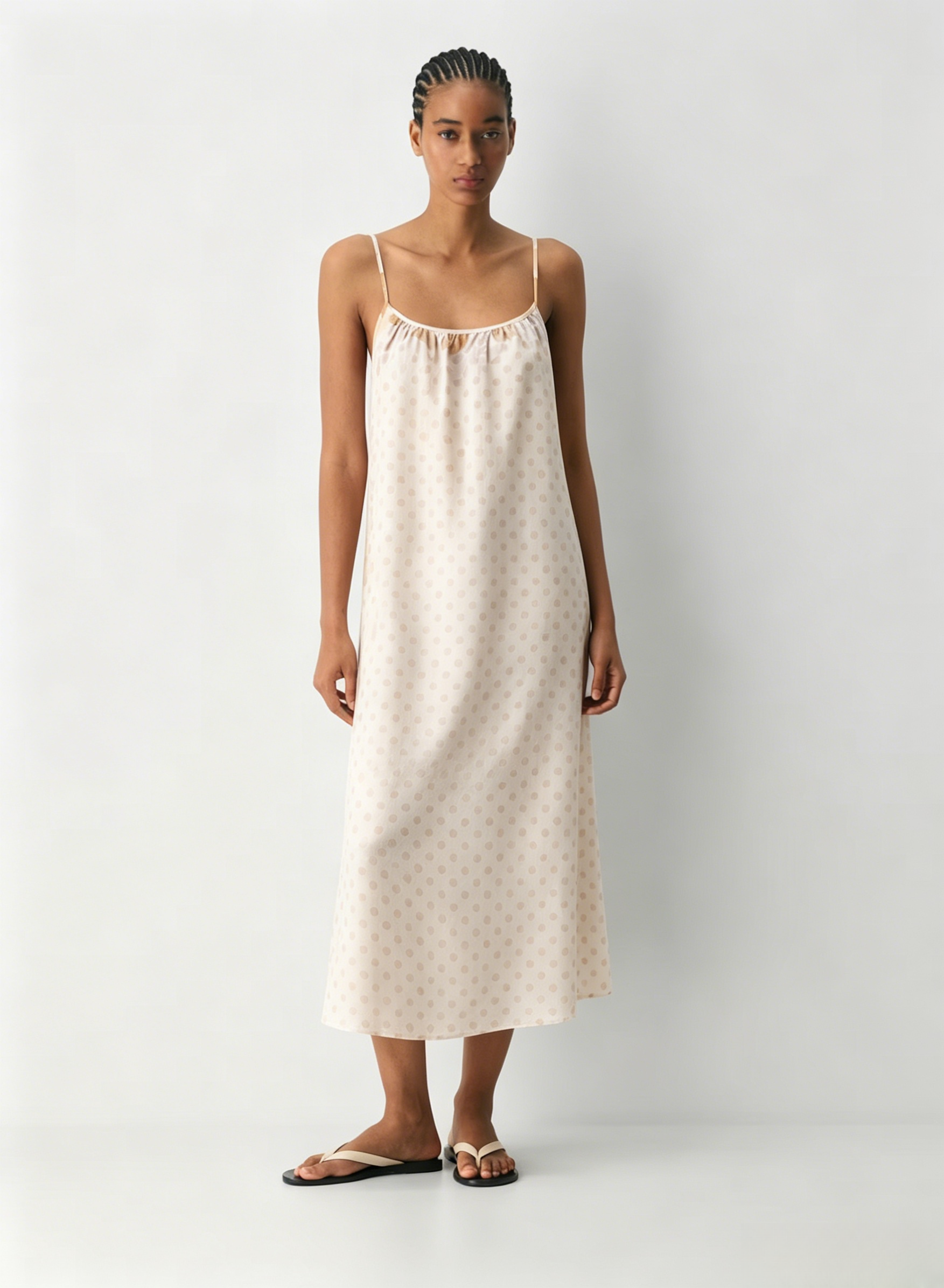 Linen Dress  A long, backless dress with a curved neckline