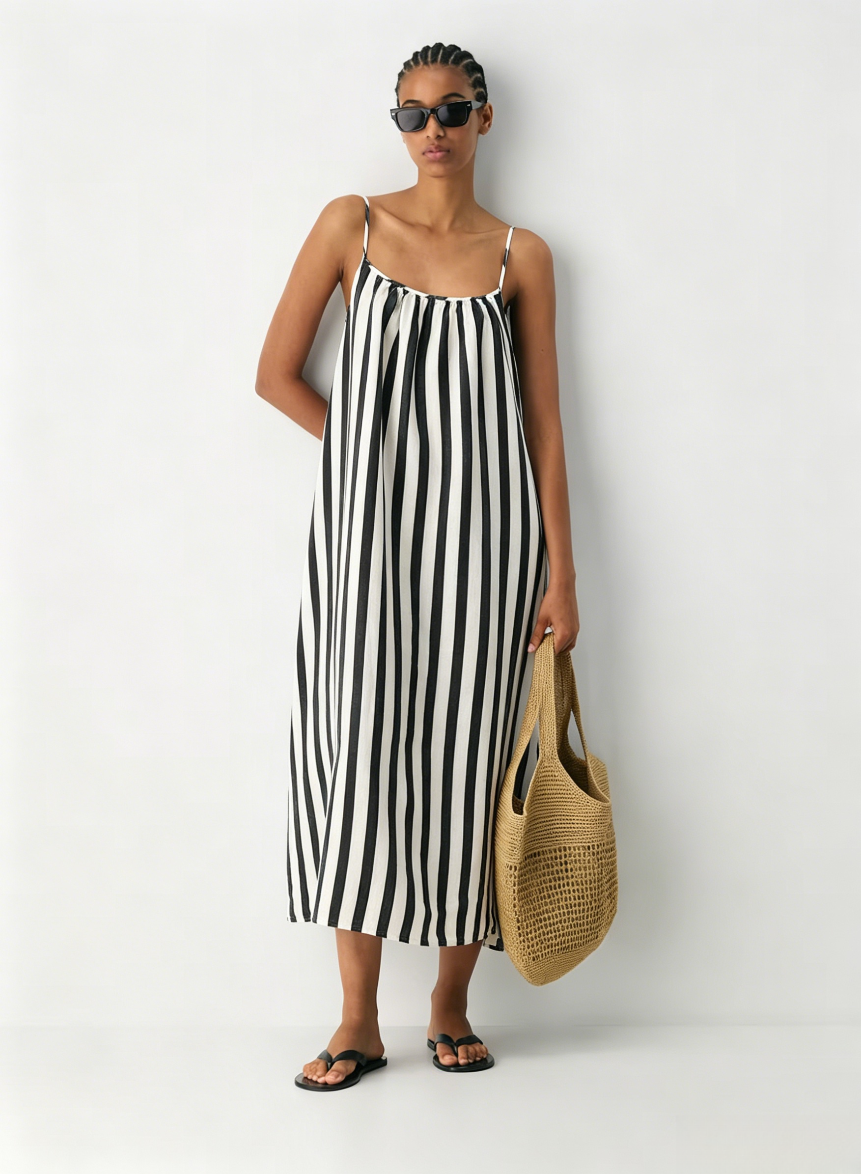 Linen Dress  A long, backless dress with a curved neckline