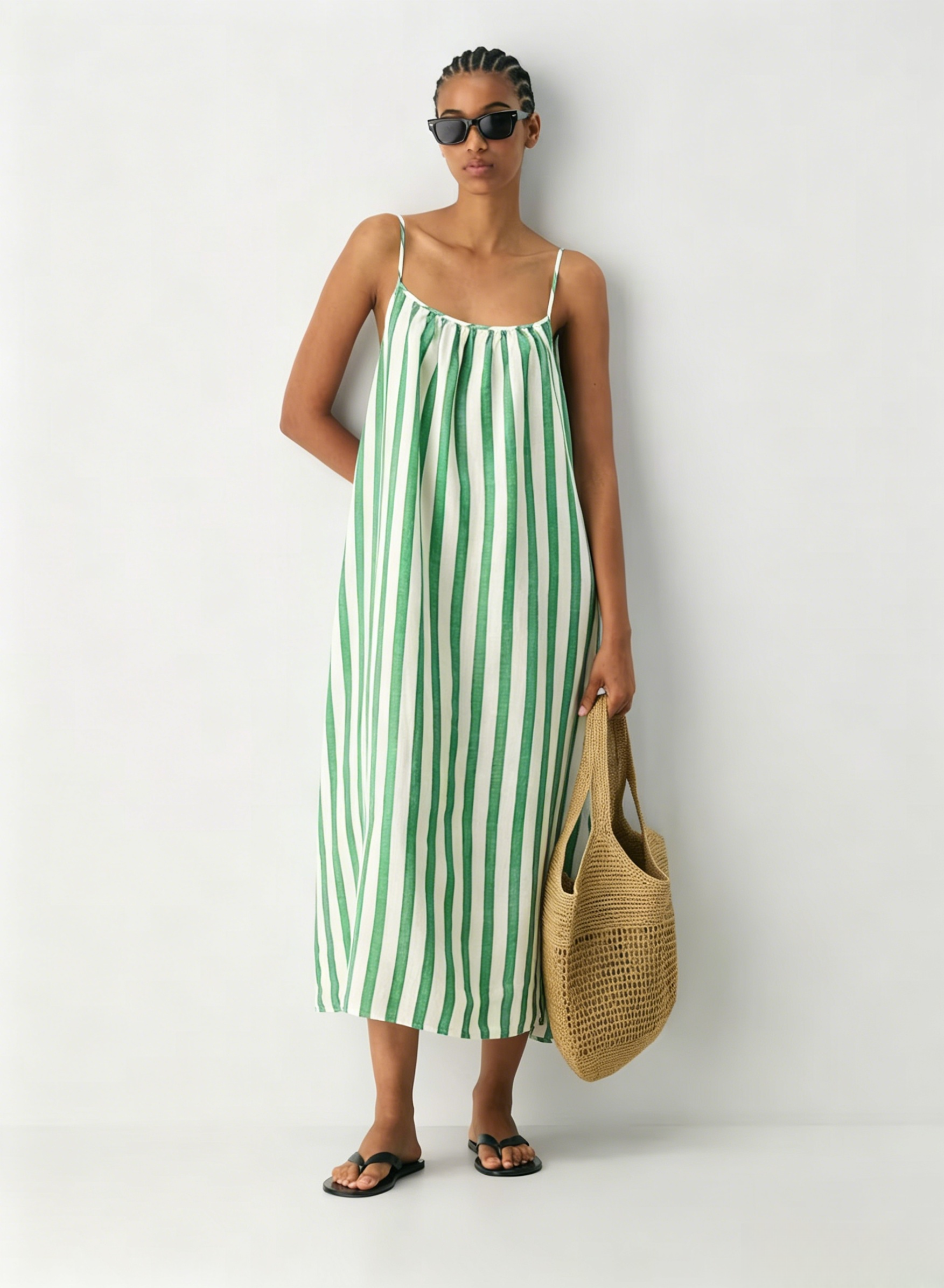 Linen Dress  A long, backless dress with a curved neckline