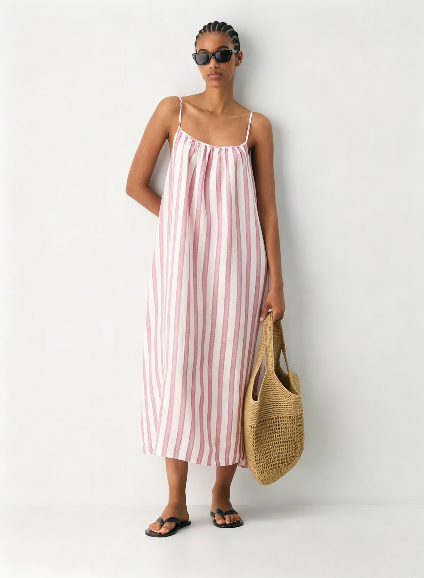 Linen Dress  A long, backless dress with a curved neckline