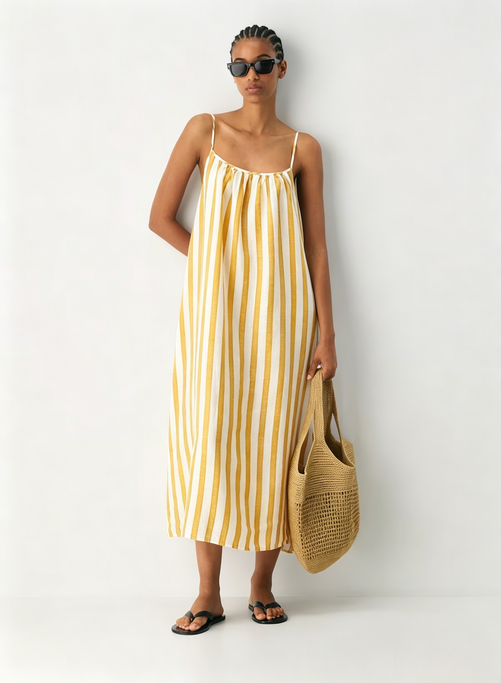 Linen Dress  A long, backless dress with a curved neckline