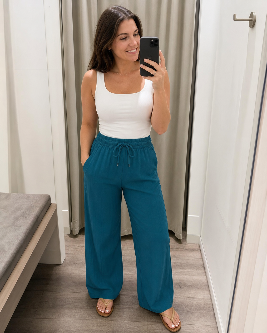 Women's wide-leg pants dressing-room mirror styling inspiration