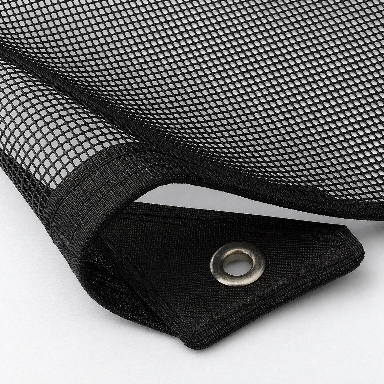 materialcloseup - Mesh edge binding reinforced corner stitching and metal eyelet