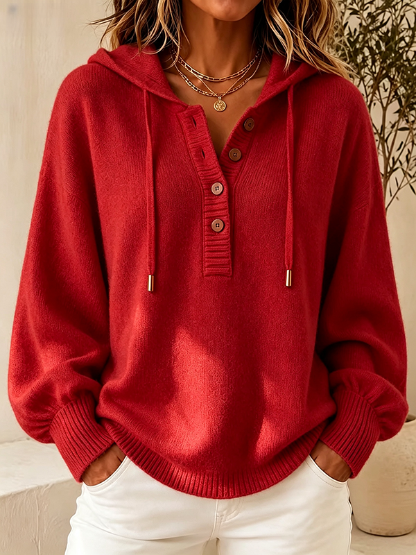 Red women's hooded knit pullover with button detail